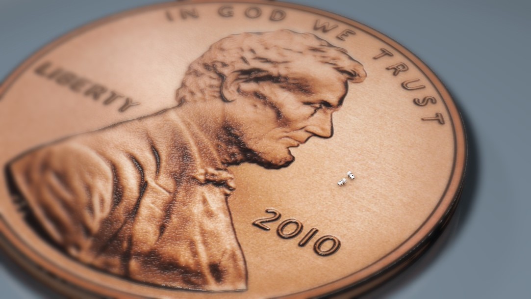 A penny is sitting on the table